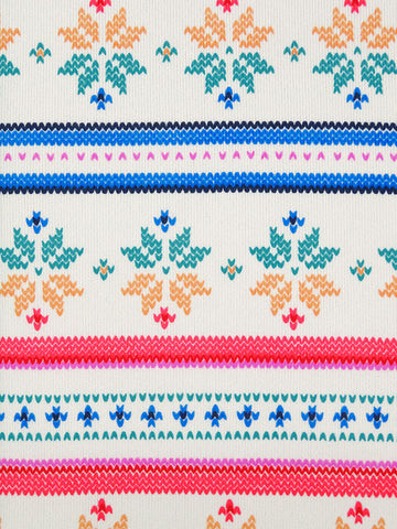 This fabric is perfect for some cozy pajamas! Horizontal snowflake stripe brushed sweater knit that is 62" wide. Bright colors with a fun design. Polyester/Lycra blend. Horizontal stripe is 9" vertical x 2" horizontal repeat. 4-way stretch 60% selvage to selvage. This fabric is a lighter weight fabric, so it falls closer to the body. Would be great for a matching pj set. 