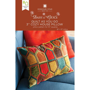 Make your home a cozy getaway with this easy to create quilt as you go house pillow! It nests together little houses to make a nice accent for your sofa or favorite chair. To begin, you'll need one package of 10" print squares, two packages of precut Daisy & Grace Quilt As You Go batting shapes (if desired) or use up all your batting scraps! You'll also need fiberfil or a pillow form to complete this project.  Finished size: 18" x 15" Pattern for 10" Squares.