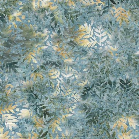 This batik is a nice cool blue with hints of tan and grey. Leafy design all over with little dots around it. Would be gorgeous paired with a cool toned batik!