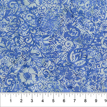 This cotton batik is from Banyan Batiks for Northcott Fabrics - This batik is made up of blues and brown greys and has floral design covering the whole fabric. The longer you look at it the more shapes you see! 