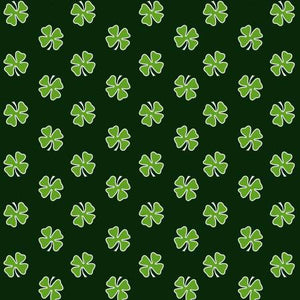 Green shamrock tossed on a black background. From Henry Glass, By Tachiera, Andrea - Hello Lucky by Andrea Tachiera Collection In Holiday -   100% Cotton, 44/5"