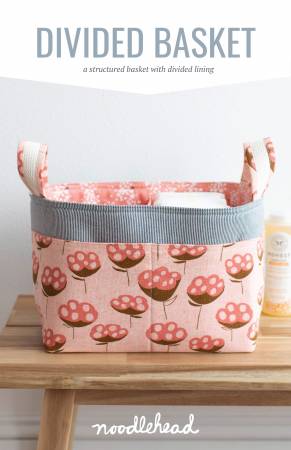 You’ll love this versatile basket for storing all sorts of goodies. It’s great for diaper storage, filling with gifts or knitting projects, and anything else you can dream up! You’ll want to make one for all of your friends! This is a structured basket with divided liner (sewn on both sides and bottom, no gaps for anything to slide through!), front pocket, and two handle variations.