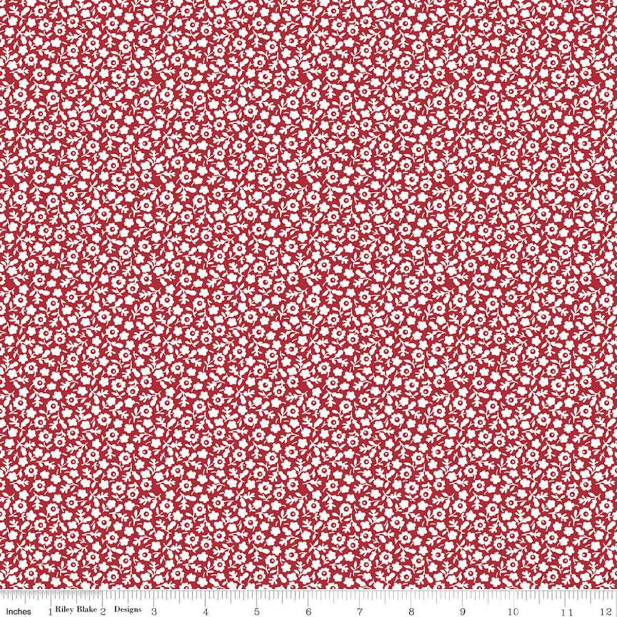 Tiny white floral design on a bright cherry red background - very simple design and can be spruced up by adding it with another fabric! 