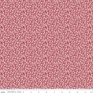 Tiny white floral design on a bright cherry red background - very simple design and can be spruced up by adding it with another fabric! 