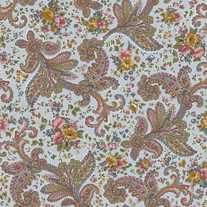Beautiful floral paisley prints from Riley Blake Designs by Gerri Robinson from the Midnight Garden Collection. This multi-colored paisley has flowers mixed into the design over a pale baby blue background. Light colors that are reminiscent of spring and would mix well with a variety of different colors. 