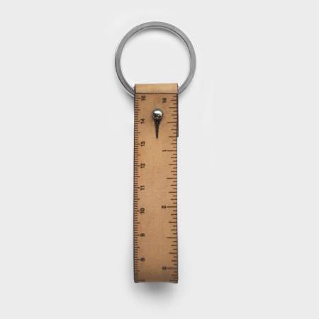 Wrist Ruler is a leather wristband with engraved inch and centimeter measurements. If you find yourself always needing to measure things when you’re on the go, this is the perfect product for you. Sizes are based on wrapping around your wrist twice. Give it extra length depending on how loosely you want to wear it. Please allow an extra 1/2 inch for the stud closure. Wrist Ruler is made in the US.