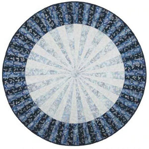 Wagon Wheel is the obvious choice if you are looking for a tablecloth for a round table. Or piece in holiday fabrics, leaving a slit and opening for a tree skirt. At 65-inches, this is big enough to add that awe factor to any tree!  The spokes are cut with the Creative Grids 10 Degree Triangle Ruler. The center is covered with a circle cut with the Creative Grids Circle Templates.