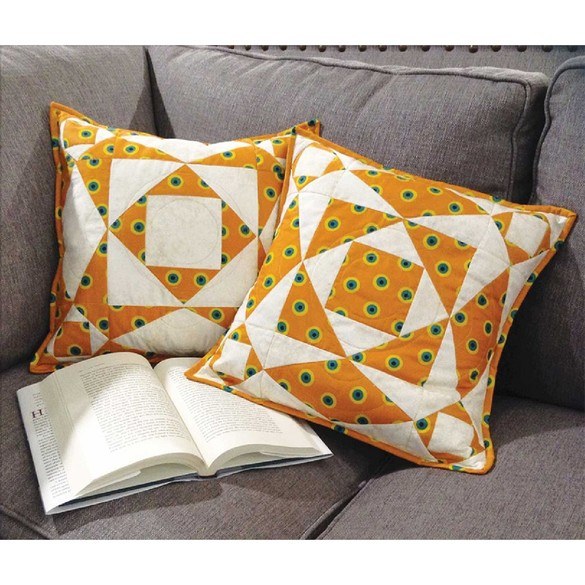Ready to take a step forward in your quilt-ability? It's time to make some pillows! The Cut Loose Press Storm at Sea Pillow Pattern is a perfect follow-up to your first projects. This pattern requires minimal time and material, making it ideal for quick-quilting and getting some practice in before you move on to more intricate work. Complete this project using the Creative Grids Two Peaks in One and Square on Square 8" trimming tools (not included).