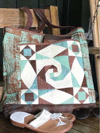 Are you ready for some beach time? The Stormy Beach Tote is just the ticket to get you organized with plenty of room for your towel and sunscreen! The center square and corner-posts are created with the Creative Grids Square on Square Trim Tool for 3 and 6-inch finished blocks. Why not learn how to make a fun, new block?