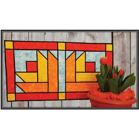 CLPKHL009 - 17in x 31in. The Creative Grids 4-1/2 x 18-1/2 inch rectangle (CGR418) and the Creative Grids 45mm rotary cutter (CGRCUT45) are recommended. Designed by Kris Holderness. This pattern includes fabric requirements and instructions to complete the project shown. Confident beginner skill level.