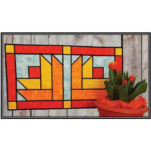 CLPKHL009 - 17in x 31in. The Creative Grids 4-1/2 x 18-1/2 inch rectangle (CGR418) and the Creative Grids 45mm rotary cutter (CGRCUT45) are recommended. Designed by Kris Holderness. This pattern includes fabric requirements and instructions to complete the project shown. Confident beginner skill level.