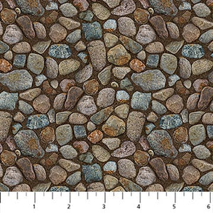 This collection was made by Rick Kelley for Northcott. This collection features different fabrics that resemble nature. This one is full of little pebbles and is great for many kinds of projects. This fabric would be a great option for collage quilting! 