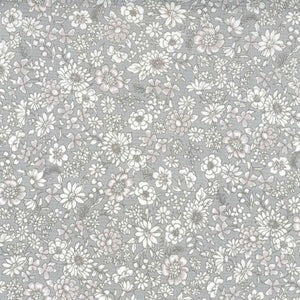 This soft grey floral fabric is covered in white flowers over a smoky grey background. Printed in Japan, this cotton would make a beautiful blouse or dress - Even great for quilting! 100% cotton, 44" wide