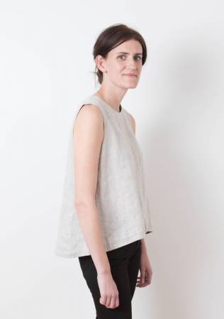 The Hadley is drapey, fluid, and sophisticated. It is the semi-formal top that you need to wear to work or to throw on over your jeans for a night out. View A has a jewel neck, a pleat at the back neckline, and bracelet length sleeves. View B is sleeveless and features a soft V-neck. Both are subtly geometric as they have center seams in front and back as well as a wide hem.