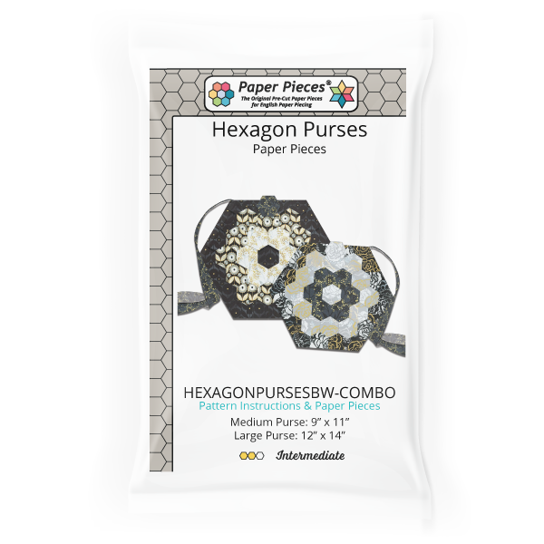 Hexagon Purses has been a top selling Paper Pieces pattern for over 10 years! A favorite at quilt shows, this pattern lets you show off your passion for piecing. A fun twist on a classic Grandmother's Flower Garden block, this is a quick project with some machine sewing.  This pattern includes instructions and Paper Pieces for two sizes, so you can treat yourself to a cute new patchwork purse and make one for a friend!  Contains Pattern and Paper Pieces to make both a medium and large purse.