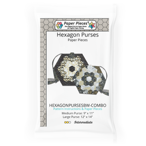 Hexagon Purses has been a top selling Paper Pieces pattern for over 10 years! A favorite at quilt shows, this pattern lets you show off your passion for piecing. A fun twist on a classic Grandmother's Flower Garden block, this is a quick project with some machine sewing.  This pattern includes instructions and Paper Pieces for two sizes, so you can treat yourself to a cute new patchwork purse and make one for a friend!  Contains Pattern and Paper Pieces to make both a medium and large purse.