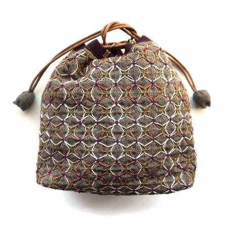 Hand-printed with water-soluble ink on yarn-dyed nep fabric. Traditional Japanese drawstring bag with KOKI. Half Kit Including: Printed cloth, metal koki x 8 ,waxed cotton cord, full English instruction.