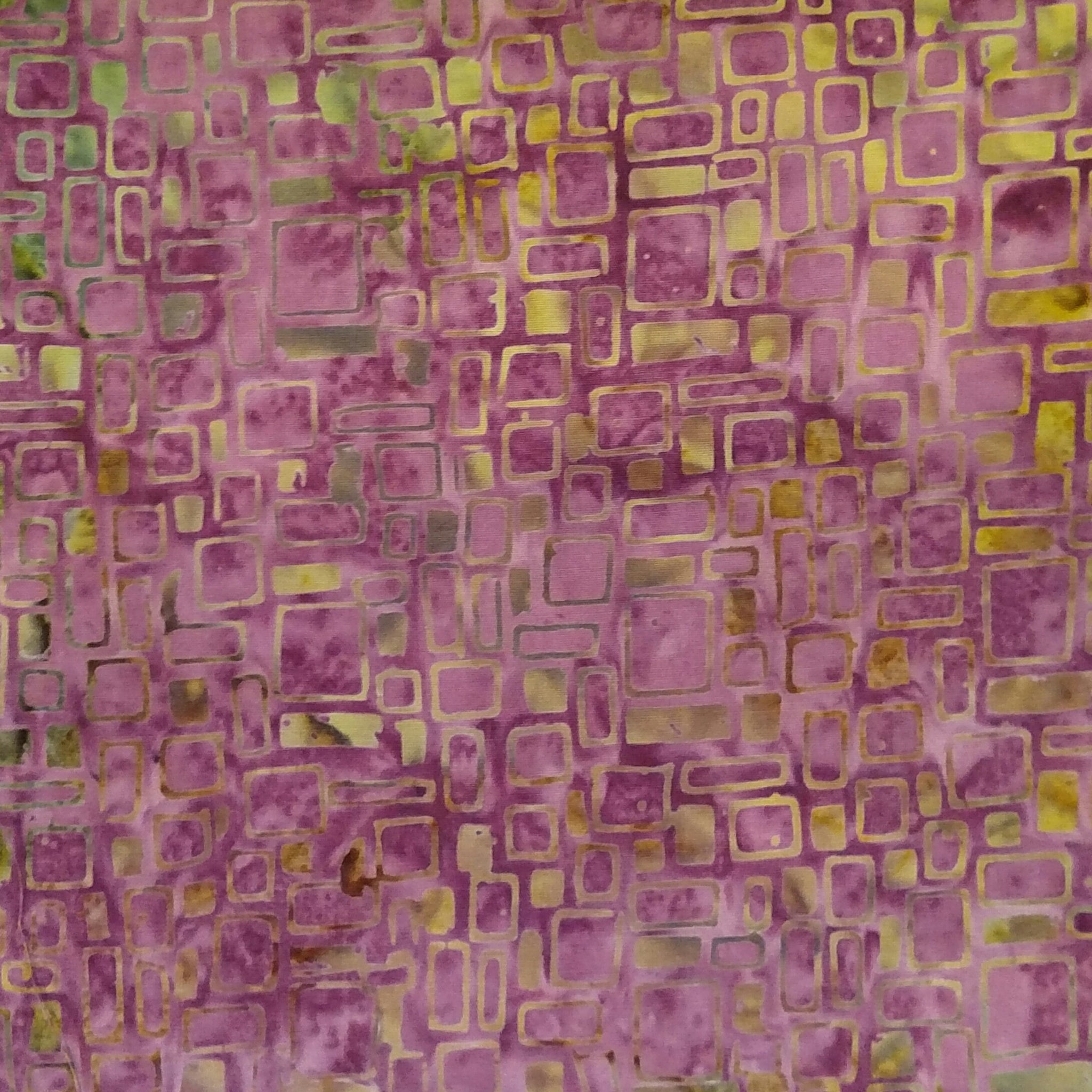 From the Speakeasy Collection for Island Batik. Tile pattern in raspberry and yellows.   100% Cotton, 44/5"