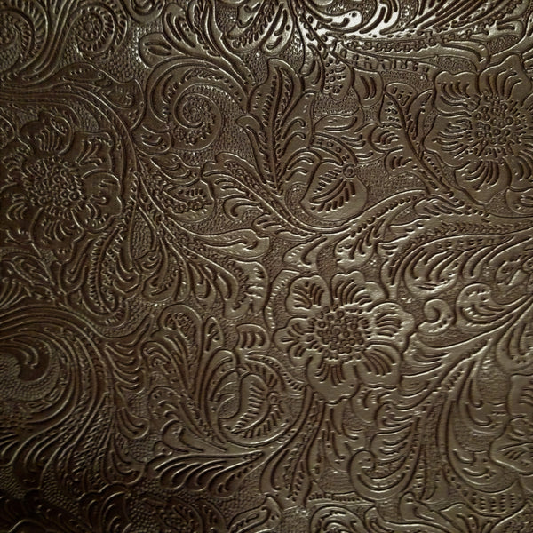 54" wide embossed vinyl. Durable material that can be used for all sorts of different projects! Make bags or cover upholstery with it!  Priced by the 1/2 yard