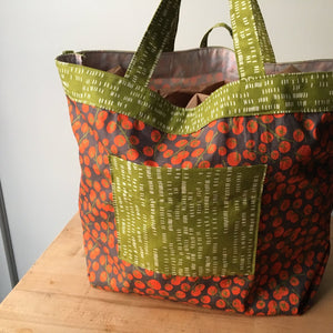 It's so easy to be green! Keep these lightweight, washable bags in your car and you'll be ready to run errands anytime! Easy loops on the top and sides will hold your bag steady while packing groceries. Tuck the bag into its pocket for easy storage. Finished size: 14" x 12" x 7"   