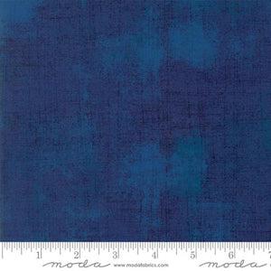Grunge basic in Regatta Blue is the perfect blender with a little bit of interest. The variation of hue ranges from deep navy to a lighter cobalt. 100% cotton 43"/44" wide. 