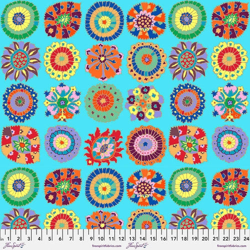 This bright fabric is from Kaffe Fassett for FreeSpirit Fabrics. This fabric has a funny name, but works perfectly for this! Little bright kaffe cookies over a bright sky blue background. Each little "cookie" is different and has its own color and design. 