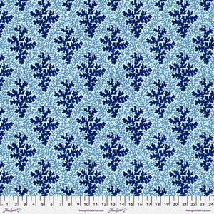 White background with dark blue coral and light blue coral. This is a repetitive fabric that is also directional. This would make a gorgeous pillow or quilt backing!