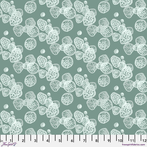 Light sage green with white jellyfish or shells! This is a beautiful soft color that looks great with all the fabrics from this collection. A great addition to the shell Rummel collection!