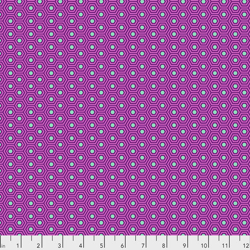 This hexy print from Tula is a fan favorite. Featuring a bright aqua center with magenta and purple outlining it.