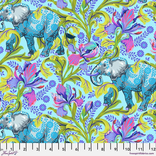 This fabric from Tula Pink features beautiful elephants surrounded by flowers and leaves. This fabric is bright and colorful with a teal background.  100% cotton 44"/45"