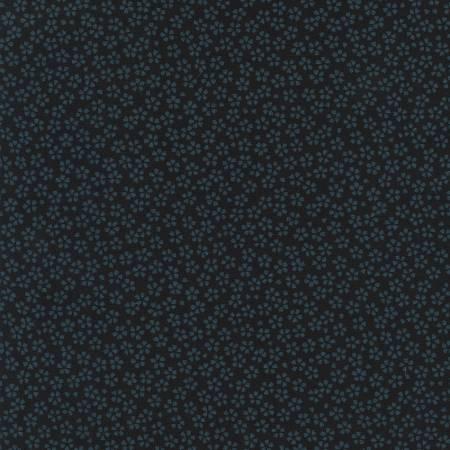 Small blue flower dispersed on an indigo background.  100% cotton homespun fabric by Sevenberry for Robert Kaufman.  43"