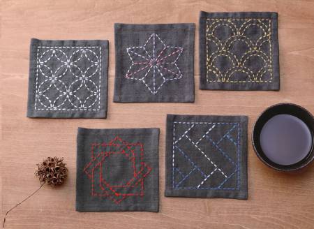 Japanese traditional stitching technique, which is very easy to learn. Its stitching lines make simple and beautiful patterns on the cloth. This contains a 6in x 26.5in cloth with designs for 5 coasters. The finished size of each coaster is 4in x 4in. Printed in Japanese.