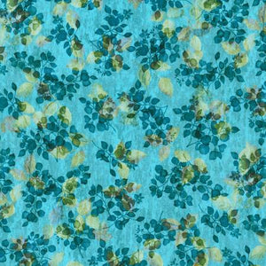 This fabric is covered in navy leaves over a light blue background with transparent yellow leaves that add depth.  100% Cotton, 44"