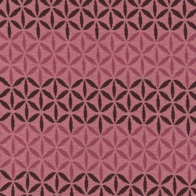 Avalana Jacquard by Stof. Pink flowers and graphics. This super soft knit would make a great sweater! Pretty rose pink as the background and maroon and hot pink design. 