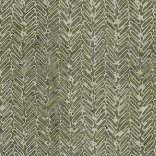 This beautiful soft rayon batik has a muted beige herringbone design on top of a subtle sage background. This is a perfect rayon for any season! Great for garments of any sorts.   100% Rayon 44"/45"