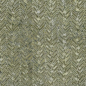 This beautiful soft rayon batik has a muted beige herringbone design on top of a subtle sage background. This is a perfect rayon for any season! Great for garments of any sorts.   100% Rayon 44"/45"
