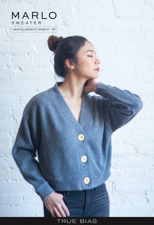 The Marlo pattern is an oversized sweater with a dropped shoulder, deep V-neck, wide bands and large buttons. View A is cropped length. View B has patch pockets and hits above midthigh.  Printed Paper Pattern Finished Size 0-18 Final Product: Wearables Technique Used: Standard Machine Sewing Skill Level: Confident Beginner