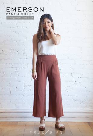 The Emerson pattern is a pull-on crop pant or short with an elasticized back and flattering front waistband. Views A and B have a mid rise that sits just below the natural waist. Views C and D have a high rise that sits over the belly button. All views have front pleats and side pockets. Views A and C are a cropped, wide leg pant, hitting a couple of inches above the ankle. Views B and D are a short with an approximate 4 inch inseam.