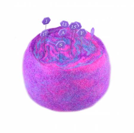 The Wooly Bun Pincushion is felted from 100% wool. Each pincushion is unique. The handcrafted pincushion is 4 inches in diameter and 2 inches tall. It makes a lovely addition to your sewing space or a cherished gift.