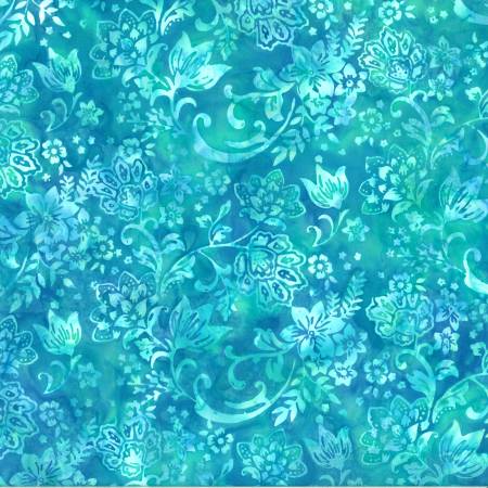 This batik is bright and beautiful! Blue floral swirly design on top of a bright turquoise background. Perfect for quilting, clothing and crafting.