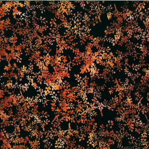 This batik is warm and moody. Black background with warm orange, red and yellow leafy design. Perfect for quilting, clothing and crafting.