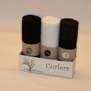 Curlers are 3 pieces of felted wool's that measure 4in x 16in each, rolled in a box ready to inspire more treasured projects.
