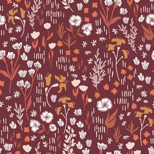Bouquets of flowers on a clay red rayon background.  Designed by Hope Johnson  for Cotton & Steel.  100% rayon, 44/5".