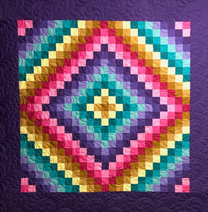 Gradations of fabric work well for this quilt as do random fabric choices. Just be sure to include sparkling value contrast in your choices...to give your quilt that eye-catching presence! 