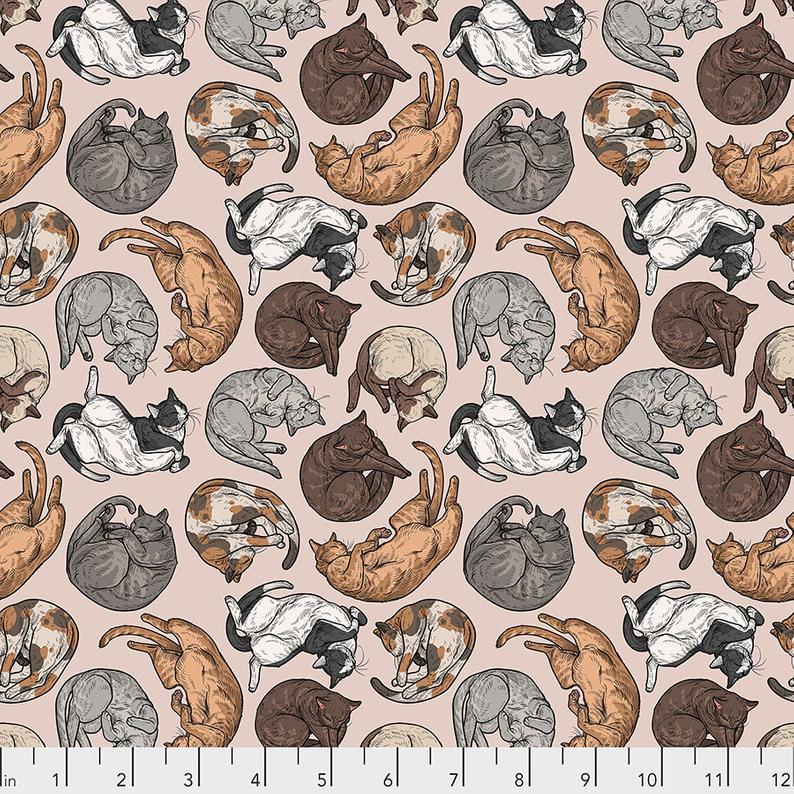 Cat Nap - Natural by Rachel Hauer.  Whimsical cats curled up and lounging on a neutral pink background.  100% Cotton, 44/5".