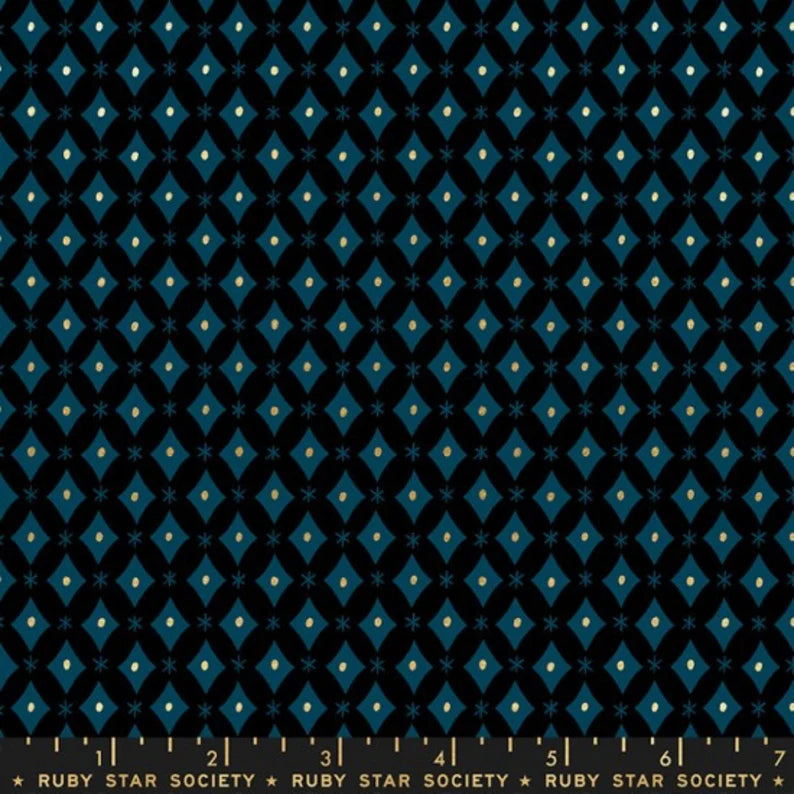 This fabric from Ruby Star Society is designed by Melody Miller for Moda. This fabric is covered in blue diamond shapes over a dark navy background. The diamond shapes have little gold dots in the middle to add visual interest. Beautiful and simple design with a little twist due to the gold! Who doesn't love a little glimmer to catch the eye?