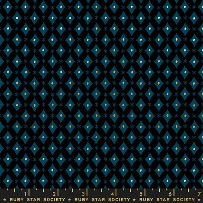 This fabric from Ruby Star Society is designed by Melody Miller for Moda. This fabric is covered in blue diamond shapes over a dark navy background. The diamond shapes have little gold dots in the middle to add visual interest. Beautiful and simple design with a little twist due to the gold! Who doesn't love a little glimmer to catch the eye?