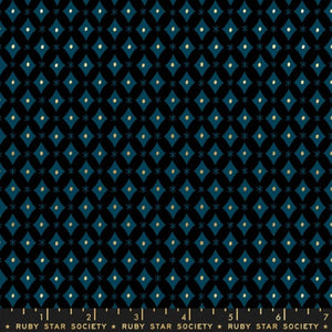 This fabric from Ruby Star Society is designed by Melody Miller for Moda. This fabric is covered in blue diamond shapes over a dark navy background. The diamond shapes have little gold dots in the middle to add visual interest. Beautiful and simple design with a little twist due to the gold! Who doesn't love a little glimmer to catch the eye?