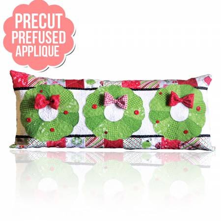 Pre cut Pre fused applique kit! Includes high quality fabrics from popular designers. Head 'n' bond lite fusible. Easy directions to follow - make this pillow and add to your Christmas decoration collection!
