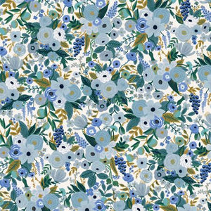 All over floral in tones of blue and ochre, on a white ground from Rifle Paper Co.  100% Cotton, 44/5"